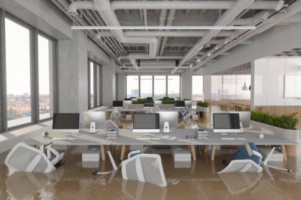 Flooded Office With Chairs Floating On Water. 3D Rendering Flooded Office With Chairs Floating On Water. 3D Rendering
